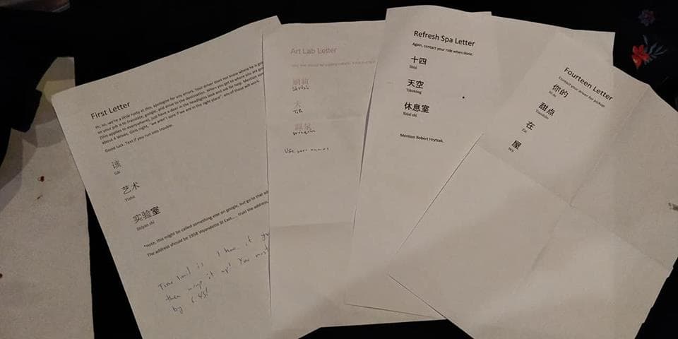 Printed instruction letters on a table — the manual predecessor to the Magic Link